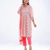 Pink all-over printed Salwar Kameez in Viscose fabric. The Kameez features a round neck and three-quarter sleeves. Embellished with pleats at the front and gathers from the waistline. Complemented by culottes pants with pin tucks border and tie-dye chiffon dupatta.