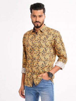 Brown casual shirt in paisley printed Cotton fabric. Designed with a classic collar and long sleeves with adjustable buttons at the cuffs. Slim fit.