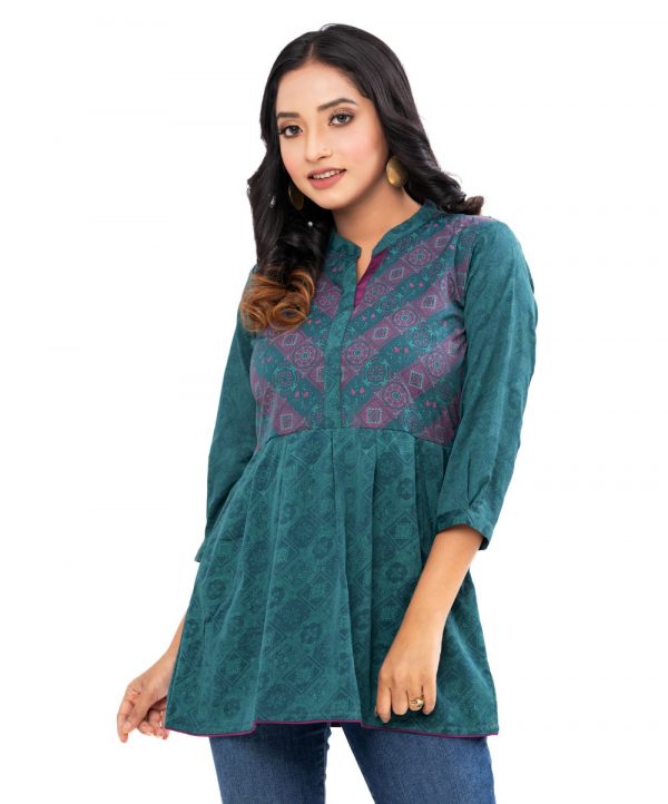 Green all-over printed A-line Top in Georgette fabric. Features a band neck with hook closure at the front and three-quarter sleeves. Pleats from the waistline.