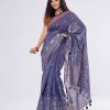 Blue all-over printed Saree in Half silk fabric. Embellished with karchupi and decorative tassels on the achal.