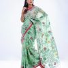 Mint green half-silk Saree with contrast paree. Embellished with all-over thread work.