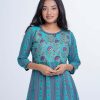 Blue all-over printed A-line Tunic in Georgette fabric. Designed with a round neck and three-quarter sleeves. Embellished with karchupi at the top front.