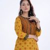 Yellow all-over printed A-line Tunic in Viscose fabric. Designed with a band neck and three-quarter sleeves. Embellished with embroidery at the front and back. Elongated hemline.