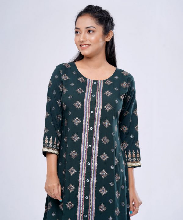 Green all-over printed straight-cut Kameez in Viscose fabric. Features a round neck with front button opening and three-quarter sleeves. Embellished with karchupi at the front and lace attachment at the cuffs. Stylized with pin tucks on the placket.