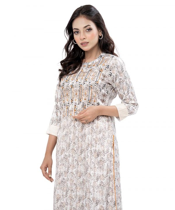 White all-over printed straight-cut Kameez in Crepe fabric. Features a low mock neck and three-quarter sleeves. Embellished with embroidery at the front. Unlined.