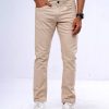 Slim fitted jeans in cotton spandex denim fabric. Five pockets, button fastening on the front and zipper fly.