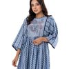 Blue all-over printed gathered Tunic in Cotton-blend fabric. Designed with a round neck and kimono sleeves. Embellished with embroidery at the top front. Button opening at the back.