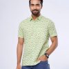 Green all-over printed comfort shirt in Slab Cotton fabric. Designed with a classic collar, short sleeves, and chest pocket.