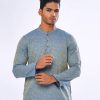 Blue fitted Panjabi in Jacquard Cotton fabric. Designed with a mandarin collar and matching metal button on the placket.