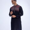 Black fitted all-over printed Panjabi in Viscose fabric. Designed with swing stitches on the collar and hidden button placket.