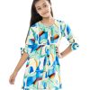 Multi-color A-line Tunic in printed Viscose fabric. Features a round neck with button-opening at the front. Three-quarter sleeves with stylish tie-knots on the cuffs. Embellished with lace attachment at the top front.