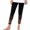 Black legging in stretchable Cotton fabric with prints on the border. Concealed elastication at the waistline.