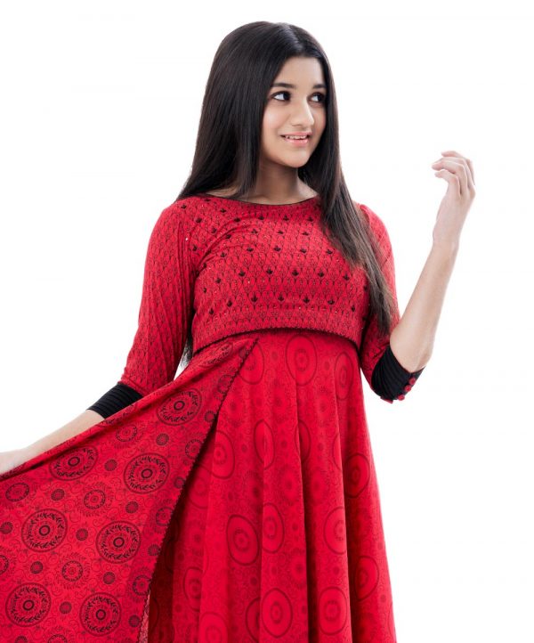 Red all-over printed layered Gown in Georgette fabric. Designed with a round neck and three-quarter sleeves with buttoned cuffs. Embellished with karchupi at the top front.