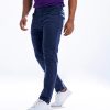 Men's slim fitted jeans in cotton spandex denim fabric. Five pockets, button fastening on the front and zipper fly.