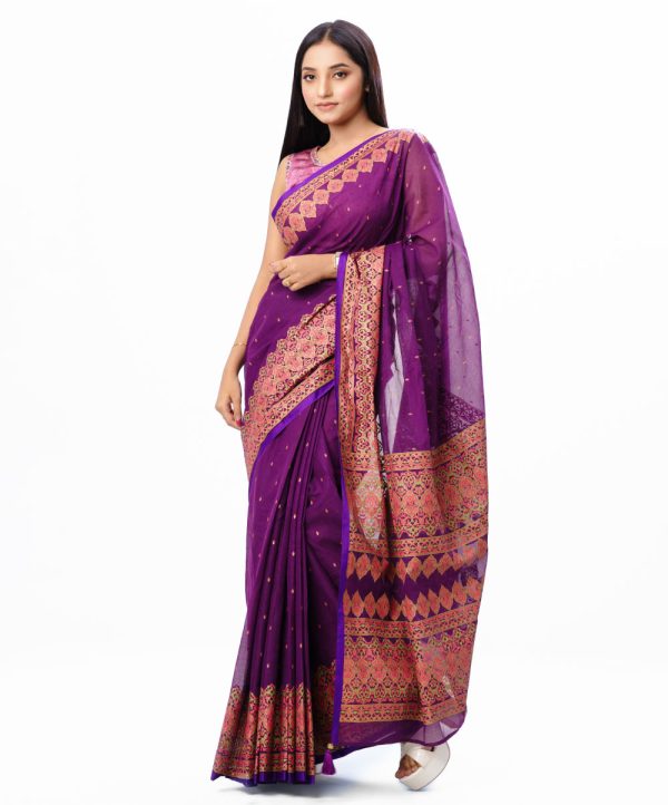 Purple all-over printed Saree in Cotton fabric. Embellished with decorative tassels on the achal.