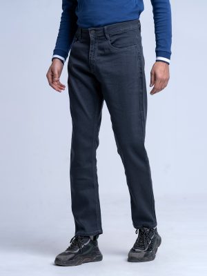 Men's slim fitted jeans in cotton spandex denim fabric. Five pockets, button fastening on the front and zipper fly.