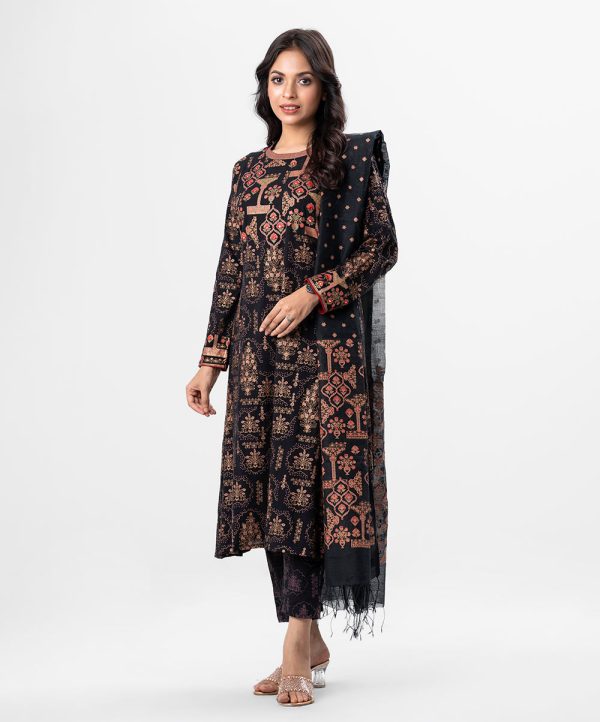 Black all-over printed Salwar Kameez in Viscose fabric. The Kameez features a low mock neck and three-quarter sleeves. Embellished with karchupi at the top front. Complemented by culottes pants and a printed half-silk dupatta.