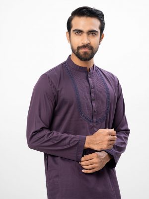 Purple premium Panjabi in Cotton fabric. Designed with a mandarin collar and matching metal buttons on the placket. Embellished with karchupi at the top front.