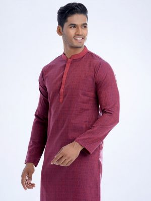 Red semi-fitted panjabi in Jacquard Cotton fabric. Designed with a mandarin collar and hidden button placket.