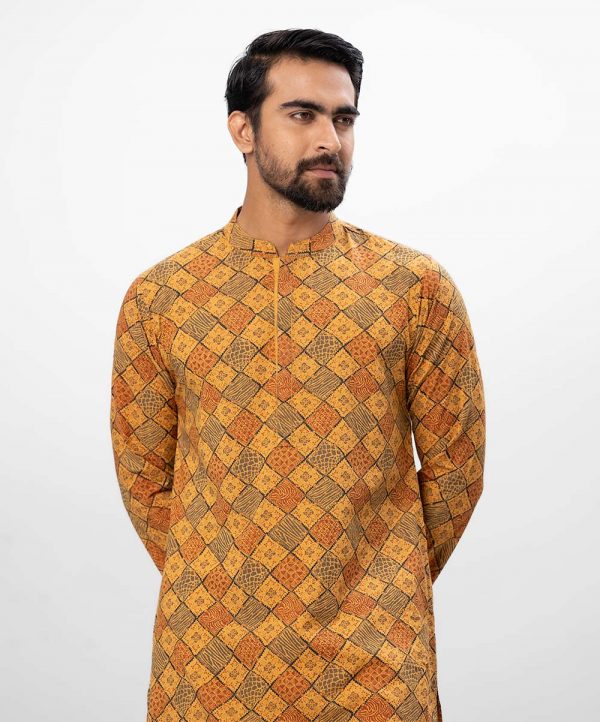 Mustard Yellow all-over printed fitted Panjabi in slab Viscose fabric. Designed with a mandarin collar and hidden button placket.