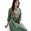 Green all-over printed A-line Tunic in Crepe fabric. Features a band neck with hook closure at the front, and three-quarter sleeves. Embellished with embroidery at the top front and pleats from the waistline. Unlined.