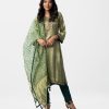 Exclusive Silk & viscose blended salwar kameez from Nargisus by Le Reve. Three-quarter sleeved, karchupi at front. Printed muslin dupatta crepe pajamas.