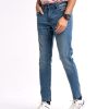 Men's slim fitted jeans in cotton spandex denim fabric. Four pockets, button fastening on the front and zipper fly.