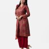 Chic V-neckline, straight salwar kameez set in printed viscose fabric. Three-quarter sleeves, karchupi at front. Tie-dye dupatta with a viscose palazzo.