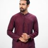 Maroon fitted Panjabi in jacquard Cotton fabric. Embellished with minimal karchupi on the collar. Matching metal buttons on the placket.