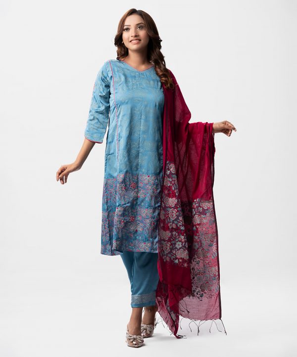 Floral printed straight salwar kameez in crepe fabric. Three quarter sleeved, V-neck and embroidery at front. Half-silk dupatta with pant-style pajamas.