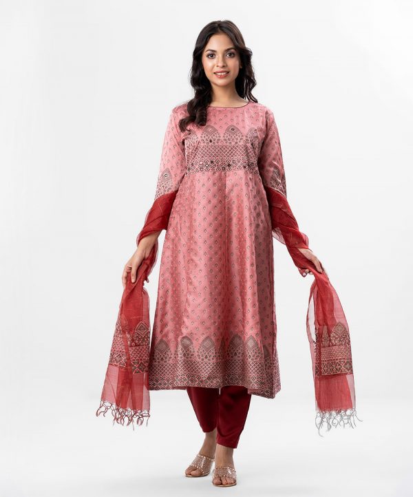 Patterned salwar kameez in viscose fabric. Three quater sleeved, round neckline and karchupi with beads. Muslin dupatta with crepe pant-style pajamas.