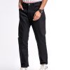 Black jeans in cotton spandex denim fabric. Five pockets, button fastening on the front and zipper fly.