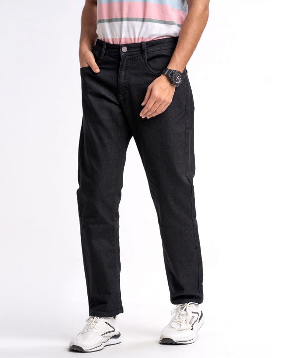 Black jeans in cotton spandex denim fabric. Five pockets, button fastening on the front and zipper fly.