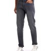 Men's regular fitted jeans in cotton spandex denim fabric. Five pockets, button fastening on the front and zipper fly.