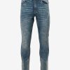 Men's jeans in cotton spandex denim fabric. Five pockets, button fastening on the front and zipper fly.