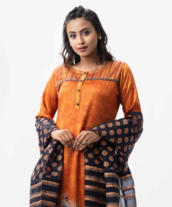 Exclusive silk-viscose blended salwar kameez set from Nargisus by Le Reve. Boat neckline, karchupi with beads and print details. Muslin dupatta with crepe pant-style pajamas.