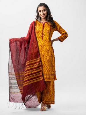 Printed salwar kameez in crepe fabric. Patch work on neck, placket and sleeves. Lace and pleat work at the front and sleeves. Half-silk dupatta with palazzo pants.