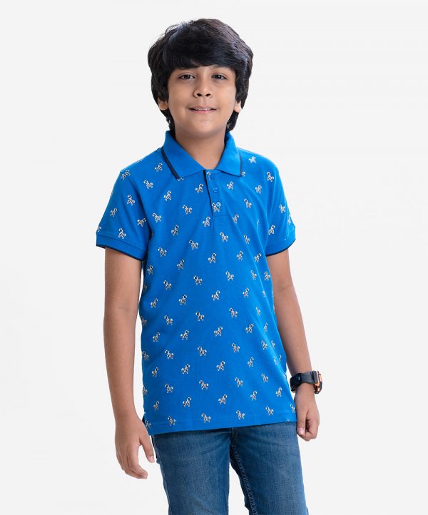 Kid boys short sleeves polo shirt in cotton pique fabric. Polka dot style toy zebra printed.