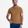 Brown polo shirt in cotton pique fabric. Classic collar, short sleeves and a straight-cut hem.