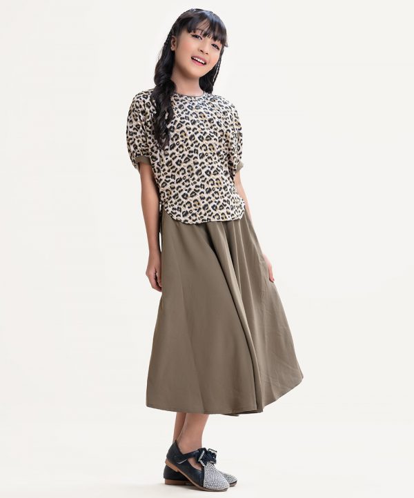 Kid girl's woven set in animal printed georgette fabric. Dolman sleeve top with two side pockets skirt.