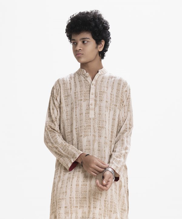 Teen boys printed panjabi in viscose fabric. Mandarin collar with metal button placket and inseam pockets.